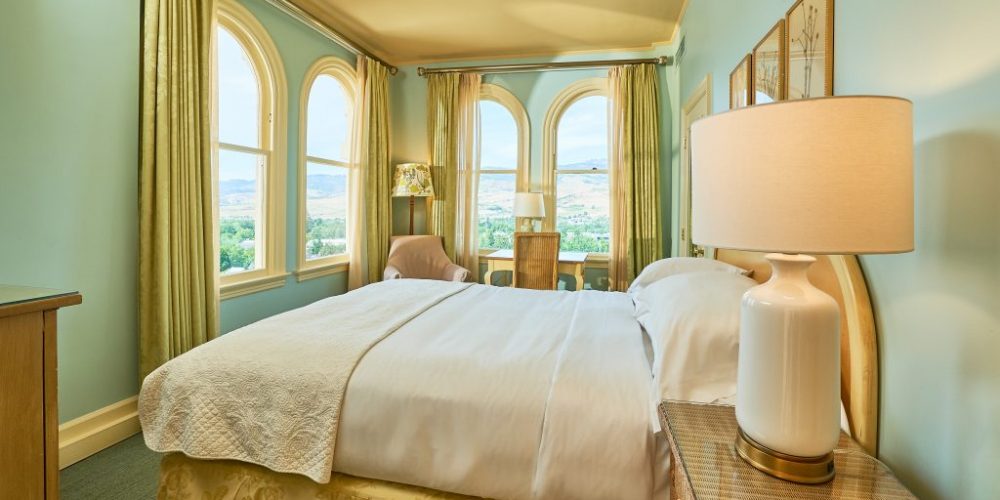 Beautifully appointed deluxe guest room with one Queen bed, offers sweeping views of Ashland and the surrounding mountains, as many of these rooms are located on the corner of the building.View Room