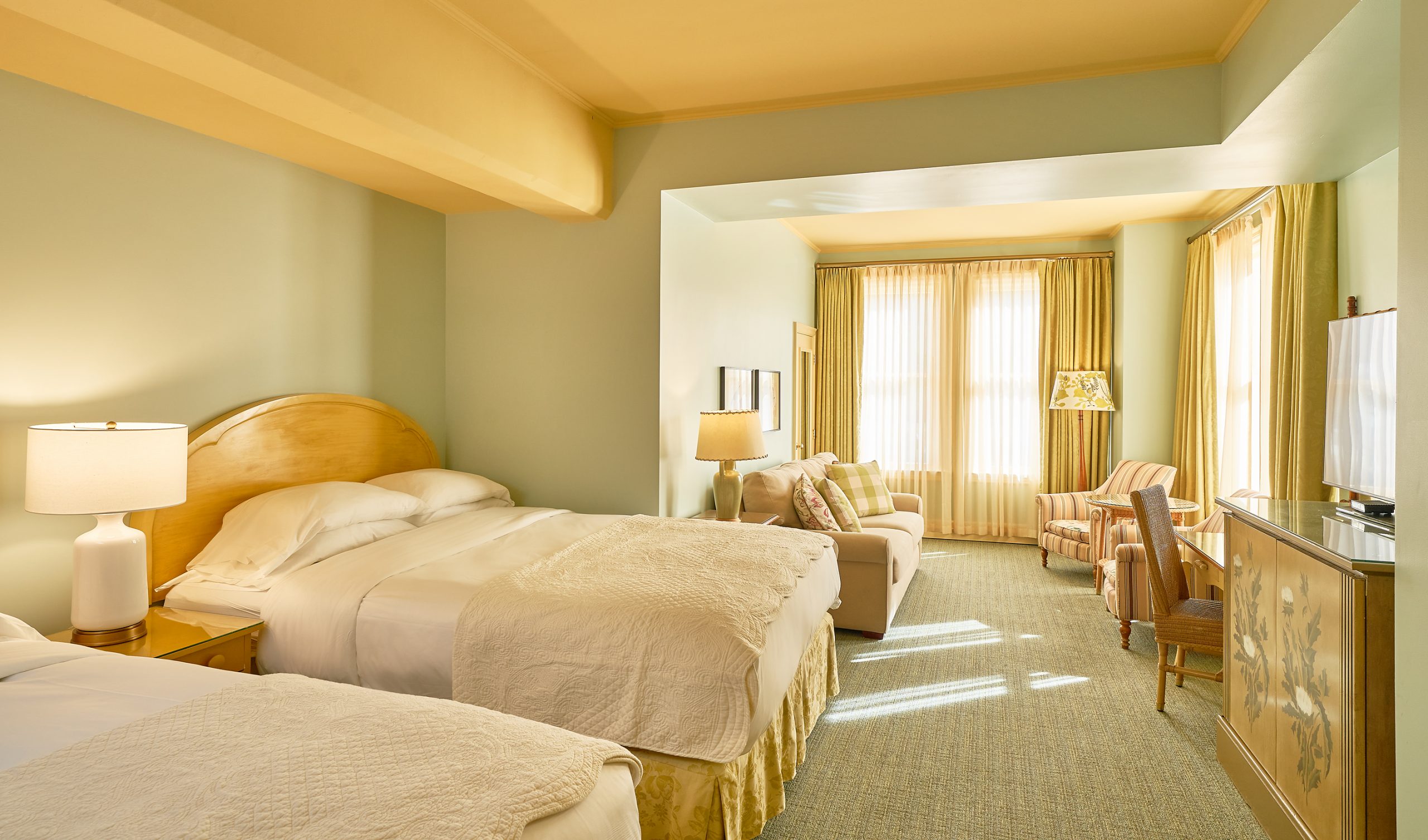 This is our most spacious accommodation and includes two queen beds, a cozy sitting area with a sofa bed and two armchairs.View Room
