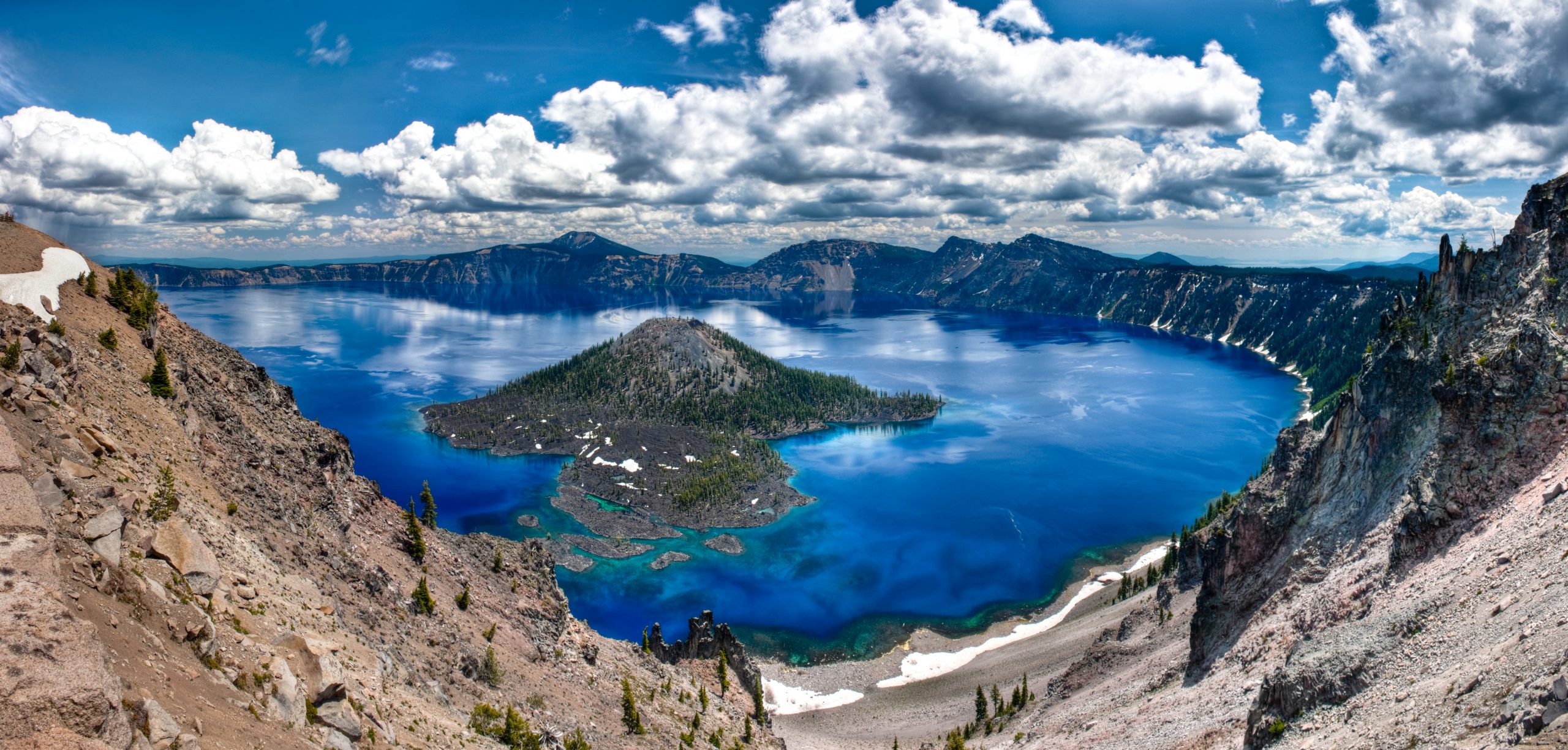 No place on earth combines a deep, pure lake, so blue in color; sheer surrounding cliffs, almost two thousand feet high; two picturesque islands; and a violent volcanic past. At 1,943 feet deep, Crater Lake is the seventh deepest lake in the world and the deepest in the United States.Learn More